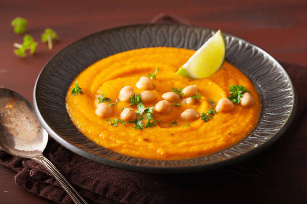 istock creamy carrot chickpea soup on dark rustic background 1092171216