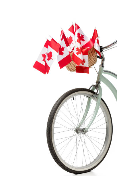 istock vintage bicycle with canadian flags isolated on white 1092171542