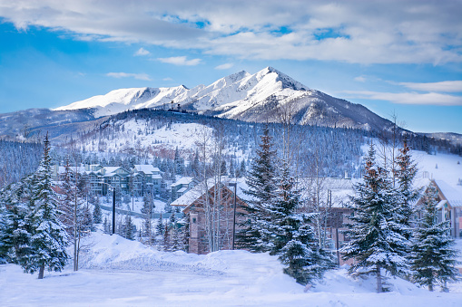 Beautiful  Colorado mountain town in winter. Snowcapped mountains and houses. Silverthorne, Colorado, USA