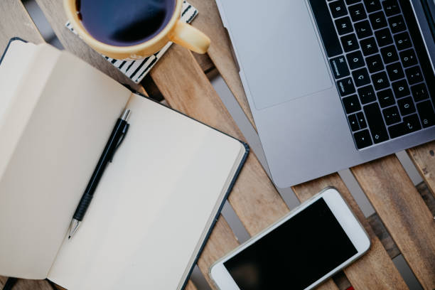 istock Technology and coffee on a wooden table 1092174880