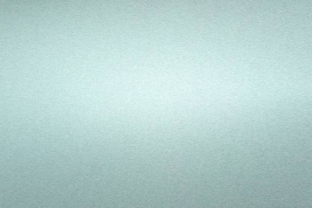 istock Light shining on rough green steel wall texture, abstract background 1092178768