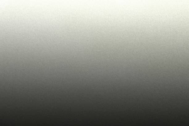 istock Light shining on rough black paint steel wall texture, abstract background 1092178774