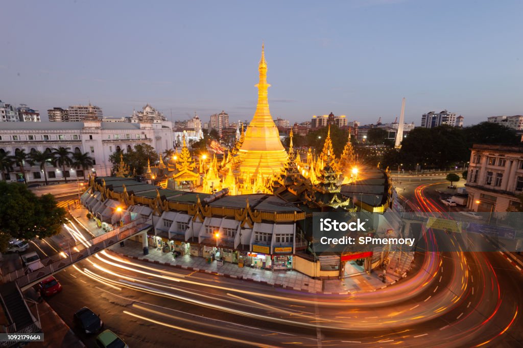 The Sule Pagoda is a Burmese stupa located in the heart of downtown Yangon.Another name in Burmese as the Kyaik Athok Zedi, is surrounded by busy streets Sule Pagoda Stock Photo