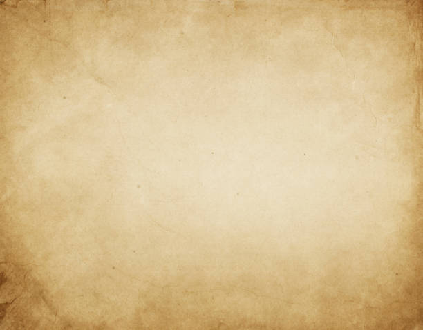 istock Old dirty and yellowed paper texture. 1092180860