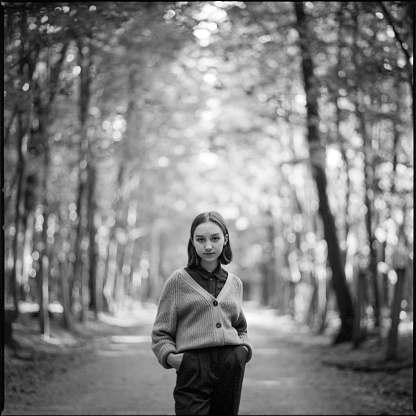 Young girl walking in forest