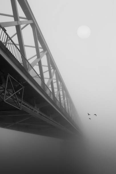 istock Bridge vanishes into winter fog 1092184794