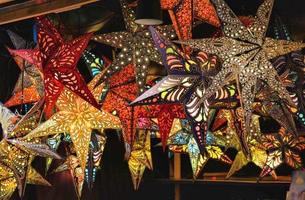 istock Christmas paper lantern stars decorations on market 1092185428
