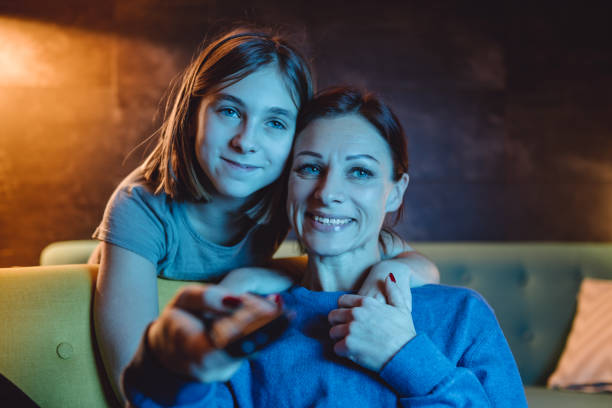 Mother and daughter watching TV