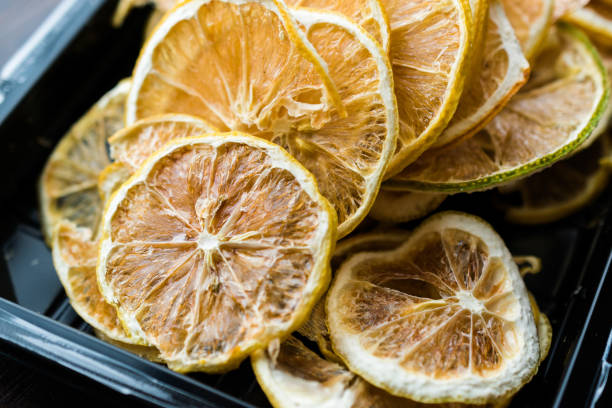 istock Package of Dried Lemon Slices / Dry and Sliced in Plastic Box / Container 1092187268