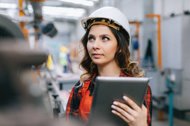 istock Young female maintenance engineer working with digital tablet 1092191236