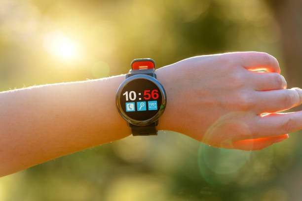 istock Woman using smartwatch with her finger 1092195912