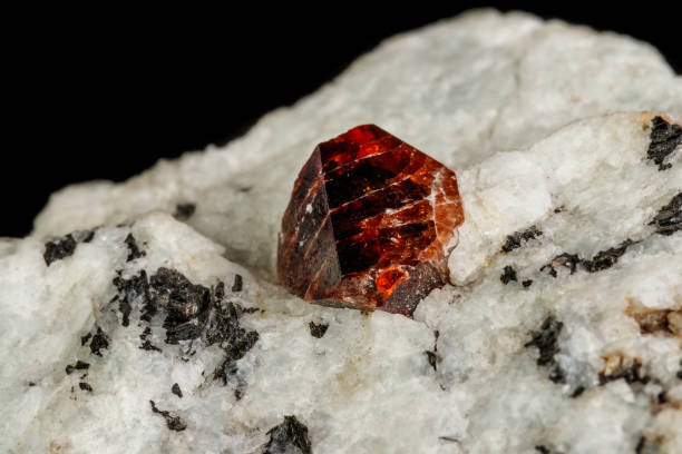 istock Macro Zircon mineral stone on a black background 1092200466