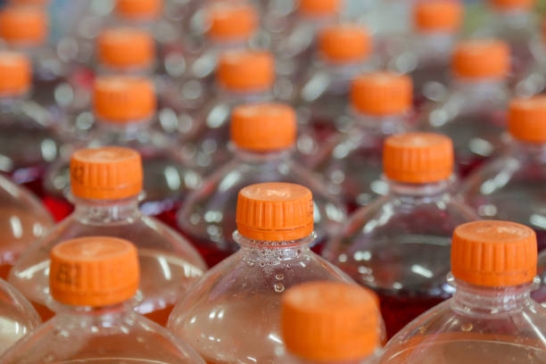 istock Many plastic bottles in a shop, caps close up 1092203484