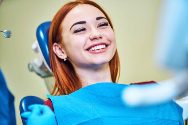 istock Dentist examining a patient's teeth in the dentist 1092204724