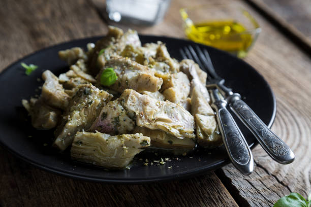 istock Baked artichokes with olive oil and herbs 1092205098