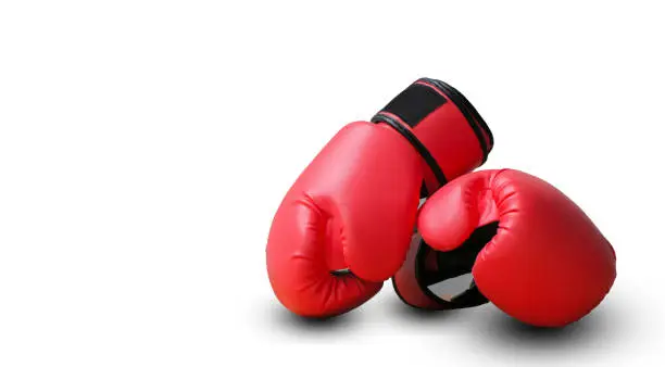 Red fighting gloves isolated on white background
