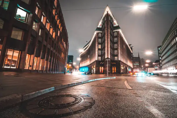 Night photo of the iconic Chile house, a traditional office building near the famous Hamburg Speicherstadt (warehouse district).