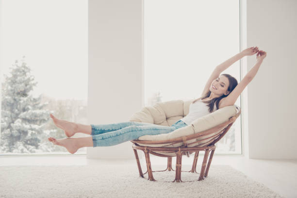 istock Full legs body size profile side view sweet gorgeous nice adorable good-looking attractive pretty lady with her beaming smile closed eyes she stretch oneself indoor cosy modern apartment room 1092206402