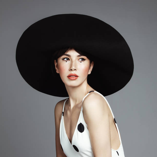 istock Beautiful elegant woman with hat 1092207970