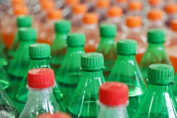 istock Many plastic bottles in a shop, caps close up 1092208750