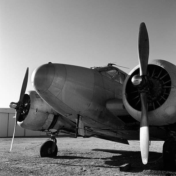 istock Vintage aircraft back lit against a desert sky 109220898
