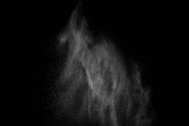 istock Freeze motion of white particles on black background. 1092209702