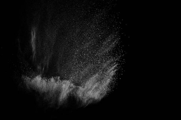istock Freeze motion of white particles on black background. 1092209716