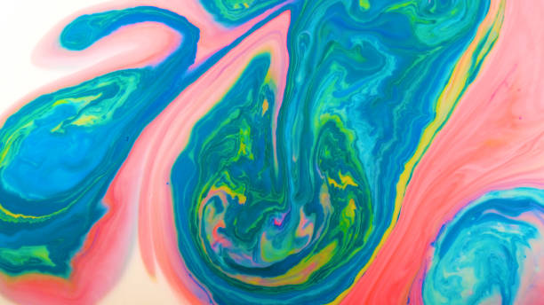 istock Colorful paints mixed in milk on the surface 1092216490