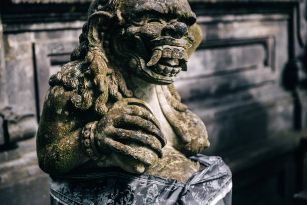 istock Stone sculpture on a graveyard on Bali, Indonesia 1092227648