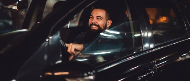 istock Male driver ride a car during evening traffic jam 1092233942