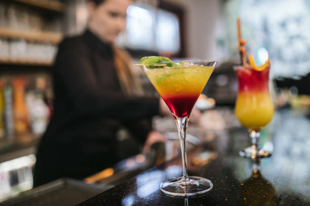 Close up of glasses of colorful cocktail in bar