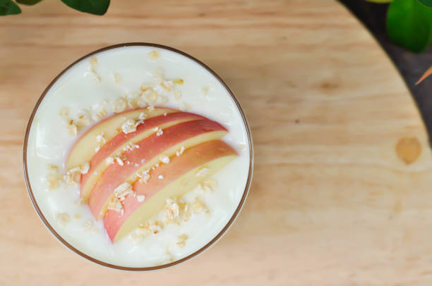 yogurt ,papaya yogurt with apple and oat stock photo