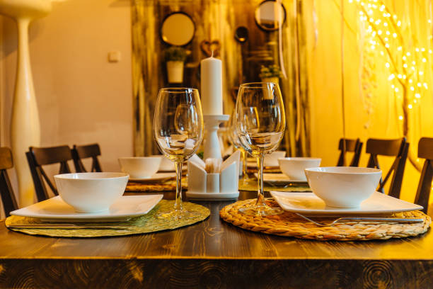 istock Beautiful Christmas table setting with lights, candle 1092245134