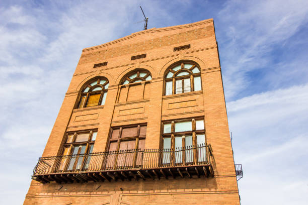 istock Retro Multi Story Brick Building With Balcony 1092245366