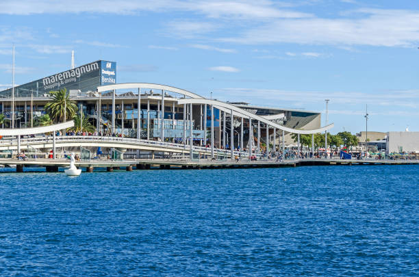 Barcelona, Spain - November 10, 2018: Port Vell with its tourist attraction Maremagnum, a mall containing shops, a multiplex cinema, bars and restaurants