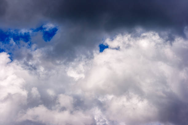 istock dense and great white clouds on a beautiful summer blue sky 1092248064