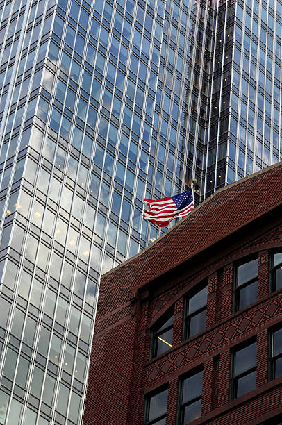 istock American flag flies beside skyscraper in Chicago. 109224879