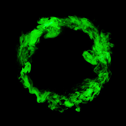 circle from green colorful smoke isolated on black background