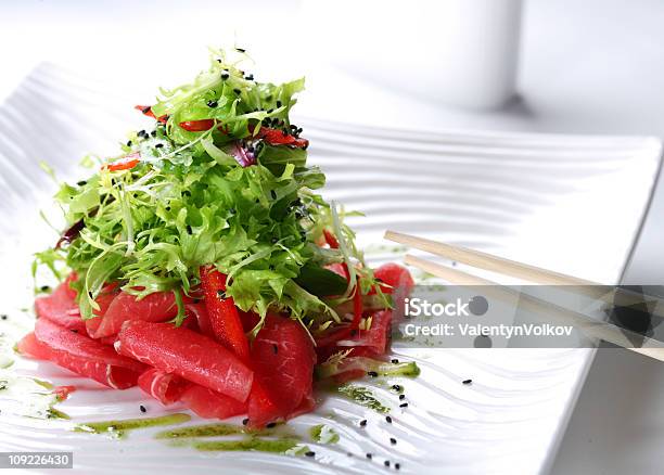 Salad With Arugula And Raw Beef Stock Photo - Download Image Now - Arugula, Beef, Carpaccio - Food