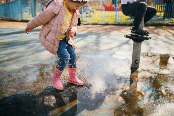 istock Jumping into a Puddle of Water 1092264646