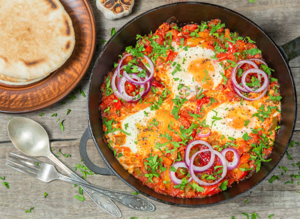 istock Traditional middle Eastern dish Shakshuka in a pan. The view from the top. Copy-space. 1092264892