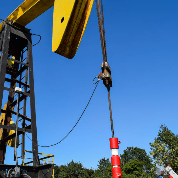 istock Pumping unit as the oil pump installed on a well 1092265144