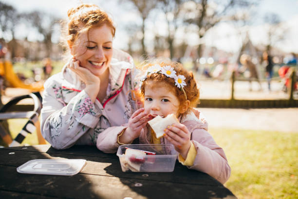 istock Eating Sandwiches in the Park 1092265278