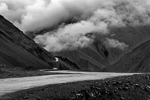 Highway of Zojila Pass, a high mountain pass between Srinagar and Leh at 11575 ft, 9 Km stretch. Highest Indian National Highway. Black and white image.