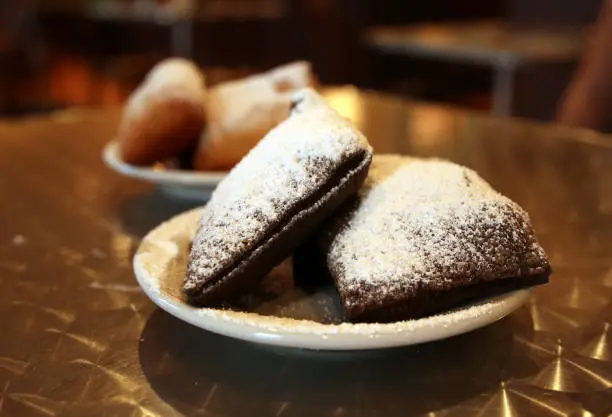 Photo of New Orleans beignets close up.