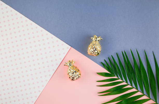 istock Tropical palm leaves on color paper background 1092273544