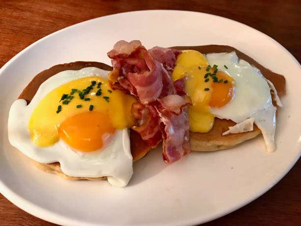 istock Salted Pancakes with Eggs and Crispy Bacon for Breakfast. Salty Fast Food. 1092274142