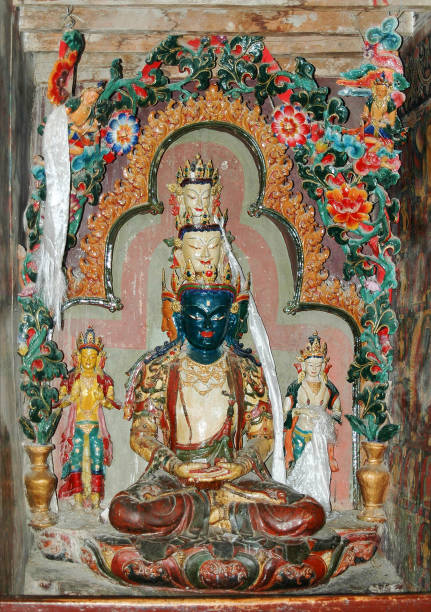 istock An ancient white tibetan deity statue with three heads in a monastery, Tibet 1092274250