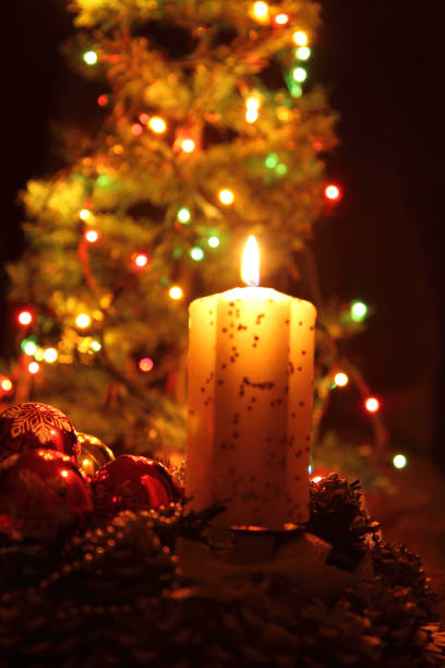 istock candle and the christmas tree 1092279220