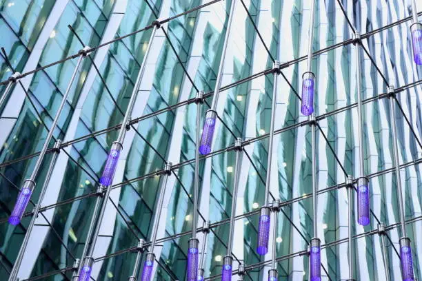 Modern building with colour showing an exterior of a building.  Clean lines and deep colours make this modern architecture stand out from the crowd of office buildings and residential properties